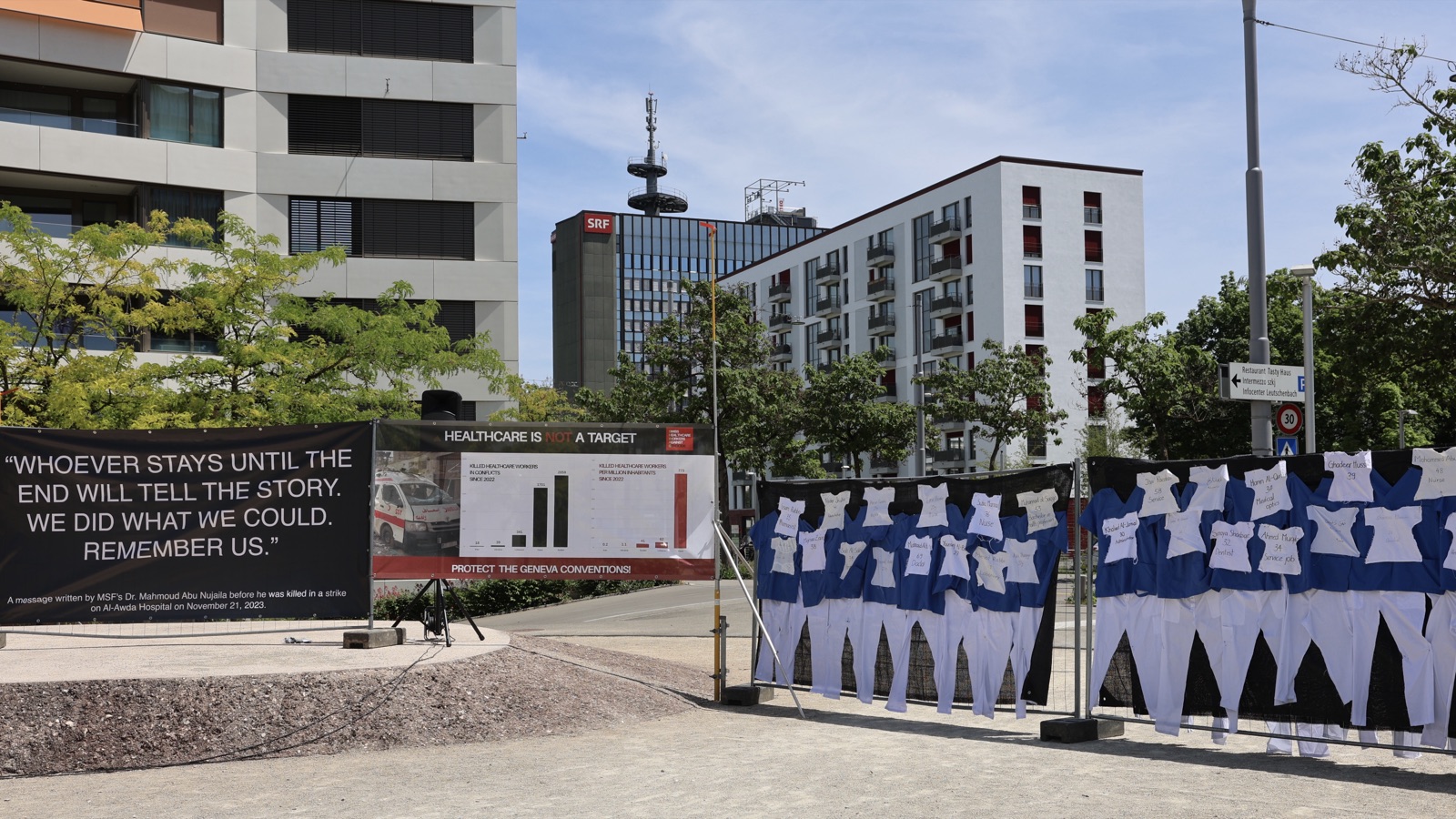 Banners and healthcare uniforms at Leutschenpark, Zurich, 30 May 2026